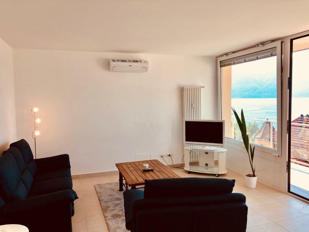 Attico Palazzo Di Vetro Apartment Luino Exterior photo